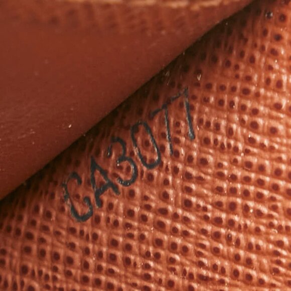 LOUIS VUITTON Brown Monogram Leather Wallet - Picture 10 of 11